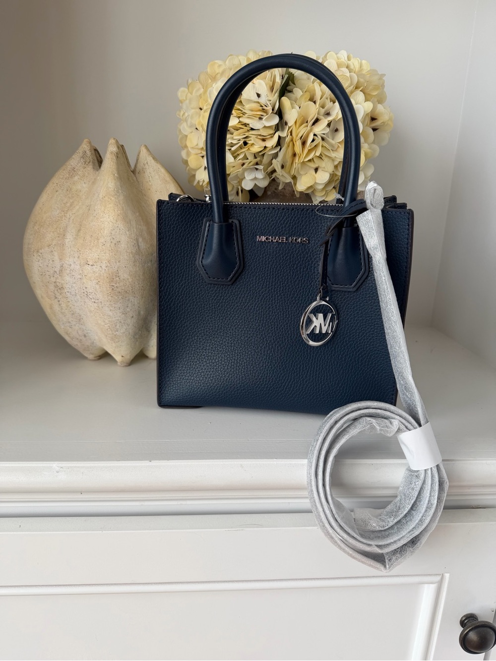 Michael Kors Navy Pebbled Leather Mercer crossbody bag with Logo Charm